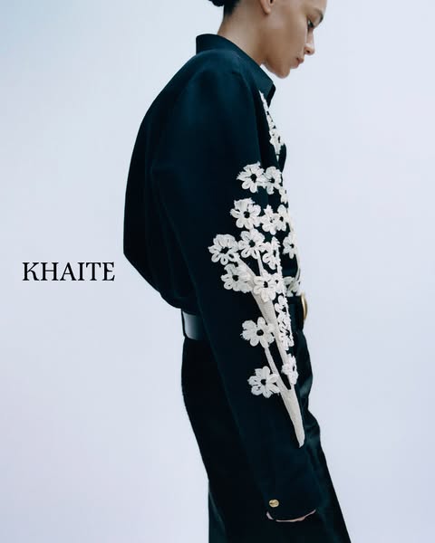 This ad features a person wearing a dark-colored Khaite shirt with decorative embroidery on the sleeve, promoting the Kh