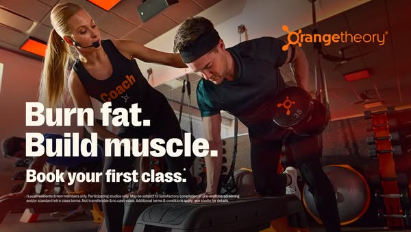 This image ad encourages the viewer to book their first class at Orangetheory. The ad features a coach guiding a man thr
