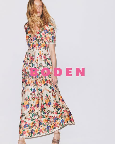 This Boden ad features a woman modeling a floor-length floral dress. The layout is clean and simple with the brand name 