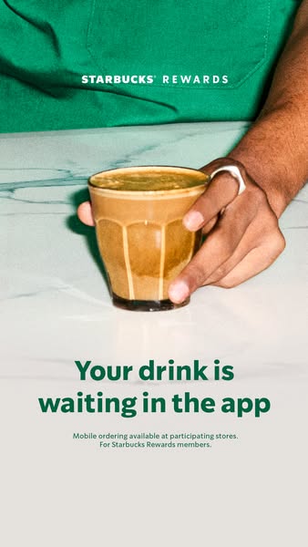 This ad for Starbucks Rewards promotes mobile ordering through the Starbucks app. It features a close-up of a hand holdi