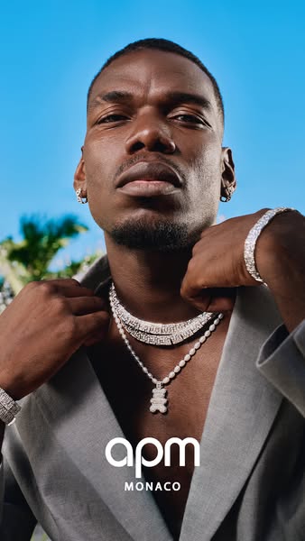 This image ad features Paul Pogba showcasing jewelry from APM Monaco.