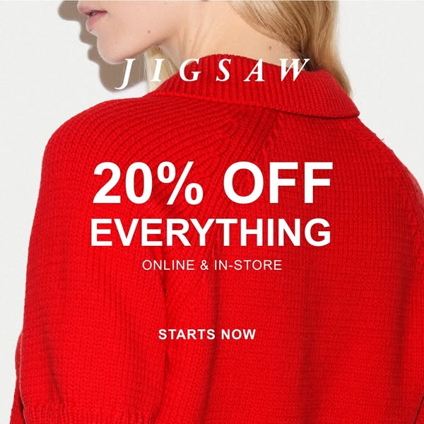 This image ad by Jigsaw promotes a 20% off everything sale, online and in-store, starting now. The ad features a close-u