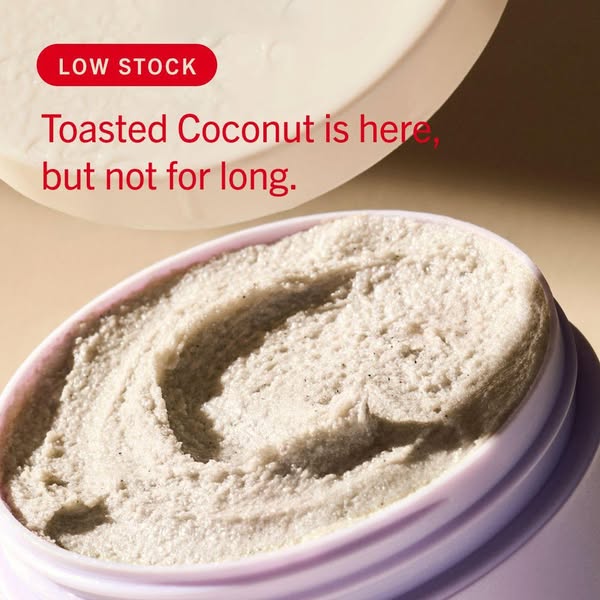 This ad shows a close-up of a jar of Toasted Coconut scrub with a top-down view of the product. The ad emphasizes the li