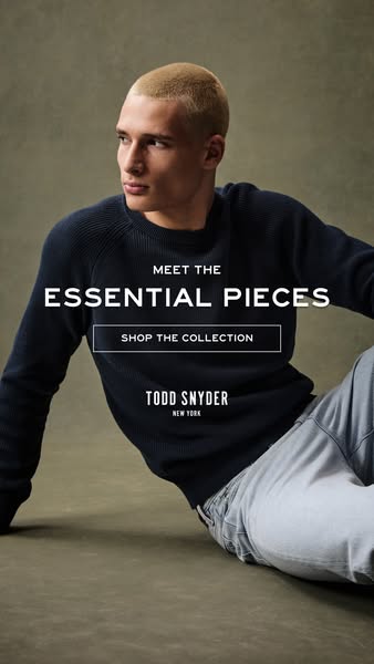 An image ad featuring a male model wearing a navy blue sweater and light-wash jeans. The ad is promoting Todd Snyder'