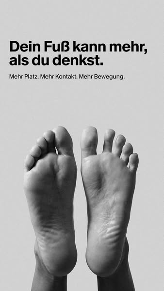 This ad uses an extreme close-up shot of bare human feet to grab attention. The German text speaks to the idea that feet
