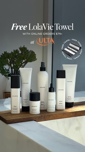 This ad promotes LolaVie hair products, highlighting an offer of a free LolaVie towel with online orders of $79 or more 