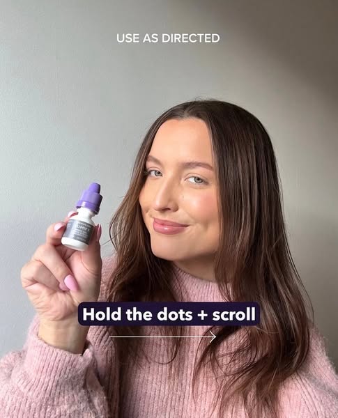 An ad demonstrating how to use Lumify eye drops. It shows a woman holding the product and pointing to on screen text tha