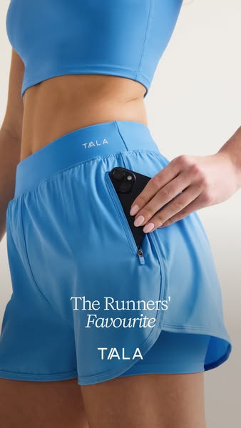 This ad highlights TALA's running shorts. The ad features the shorts and a phone being placed in the zippered pocket