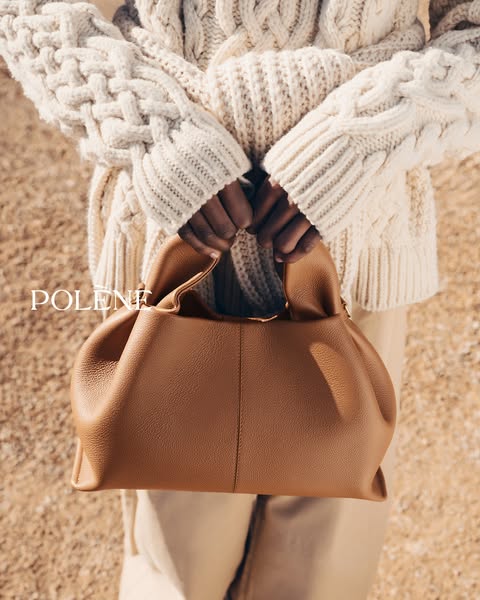 This ad showcases the Polène handbag in a neutral, earthy aesthetic. The focus is on the bag's design and texture.