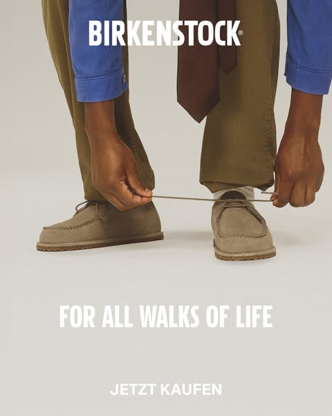 This image ad for Birkenstock shoes features a person tying the laces on a pair of taupe-colored, moccasin-style shoes. 