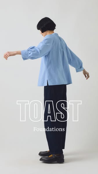 An image ad for TOAST Foundations featuring a model in their apparel.