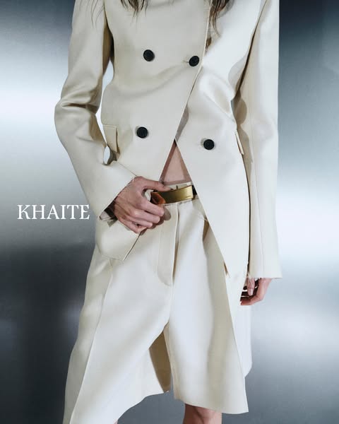 This ad is promoting a modern blazer and shorts set from KHAITE.