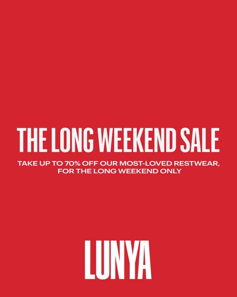 The ad showcases a sale event for Lunya restwear. It promotes a long weekend sale with up to 70% off on their most-loved
