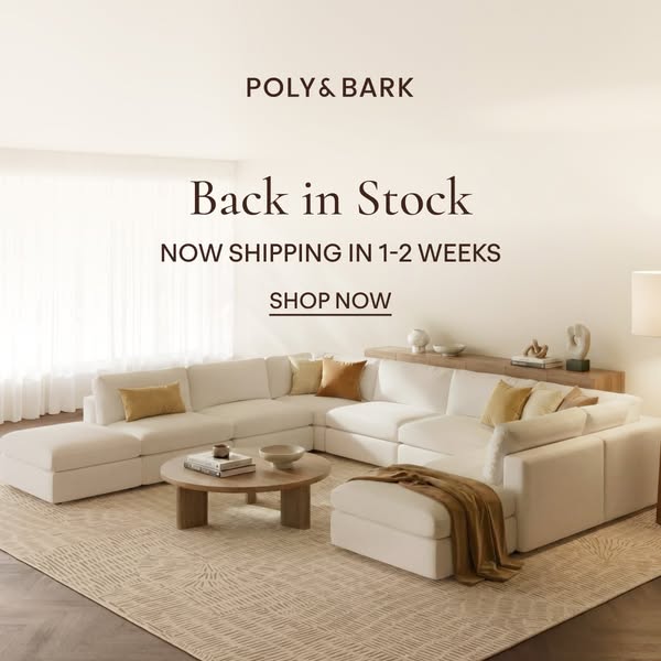 This image ad showcases a modular couch from the brand Poly & Bark. It is advertising that it is back in stock.