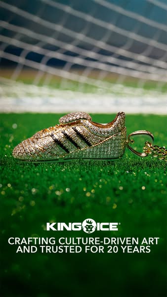 Ad for King Ice featuring a gold and diamond soccer shoe pendant on a gold chain, set against a soccer field backdrop.