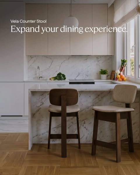 This ad showcases the Vela Counter Stool in a well-appointed kitchen. The focus is on expanding the dining experience wi