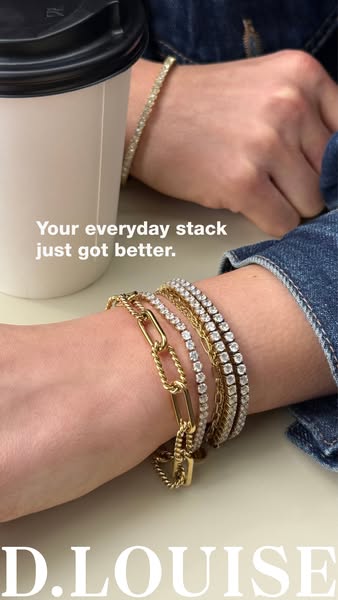 This ad showcases a woman's wrist with multiple D. Louise bracelets stacked on it. A coffee cup sits to the side, an