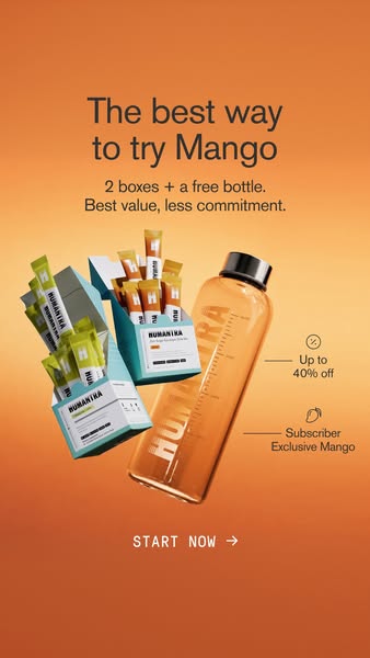 An image ad for Humantra Mango drink mix features two boxes of the product and a free Humantra water bottle against a gr