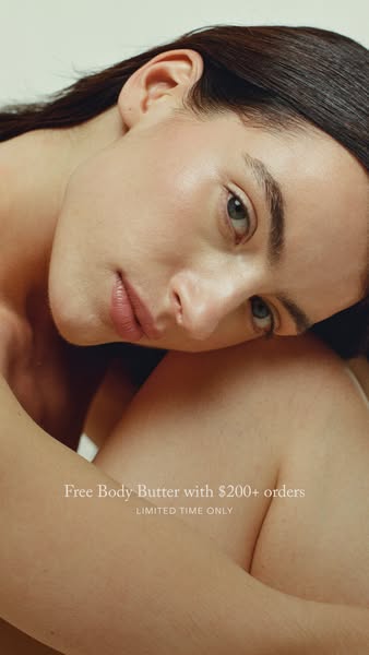 This ad is promoting a body butter by offering a free body butter when a customer spends $200 or more and says that it i