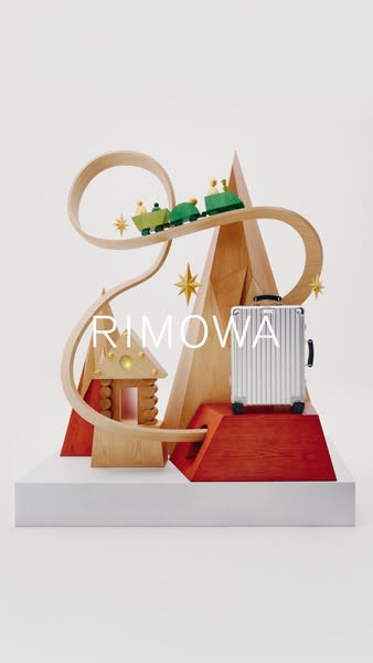 This ad showcases a Rimowa suitcase as part of a stylized set design featuring a wooden toy train and track. The ad is l
