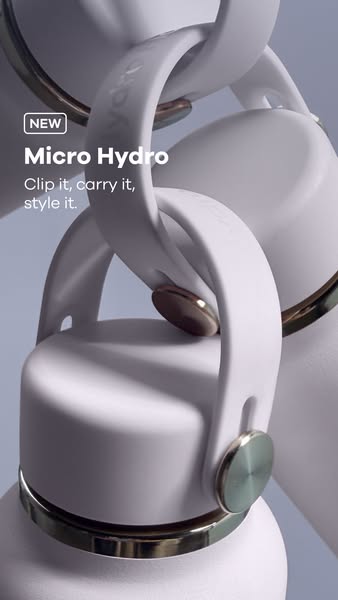 This ad shows Hydro Flask's new Micro Hydro product. The bottle is light purple with a matching handle and a metalli