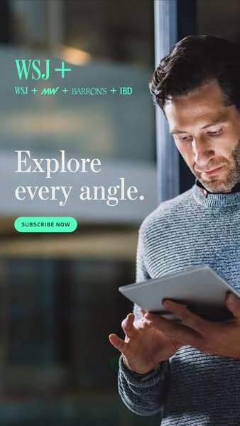 This WSJ+ ad features an image of a man looking at a tablet. The ad encourages viewers to "Explore every angle"