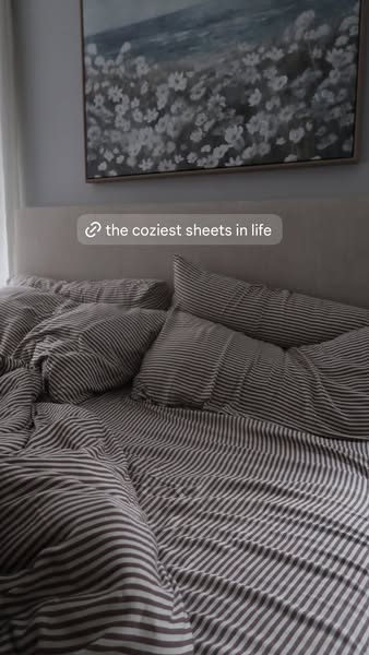 This ad showcases a set of striped sheets, emphasizing their comfort and quality to appeal to viewers seeking a cozy bed