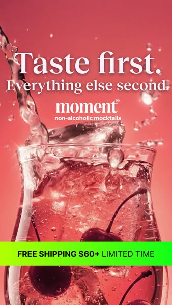 This image ad for Moment non-alcoholic mocktails features an artistic shot of the beverage being poured into a glass, fu