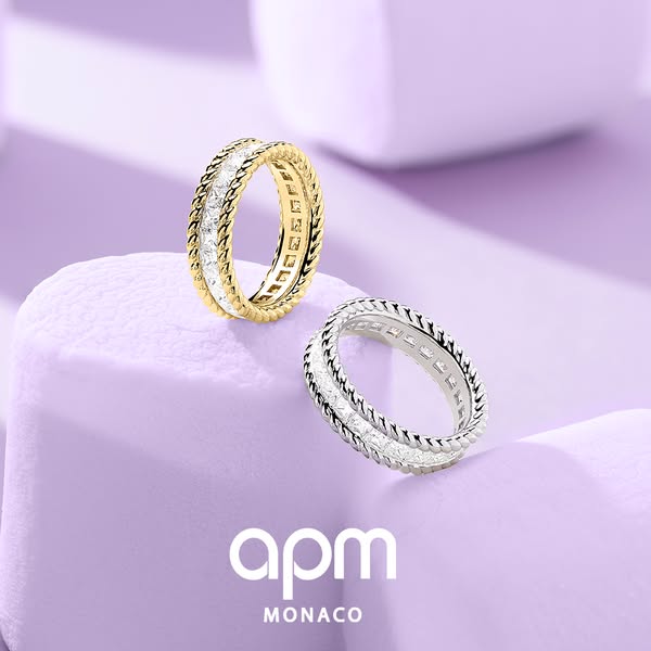 An advertisement showcasing the twisted ring designs from APM Monaco.