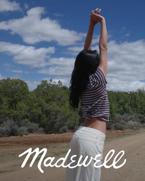 This ad features a woman stretching outdoors, showcasing Madewell apparel and promoting a lifestyle of ease and comfort.