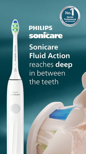The ad showcases a Philips Sonicare toothbrush. The image highlights its deep cleaning capabilities, enhanced by fluid a