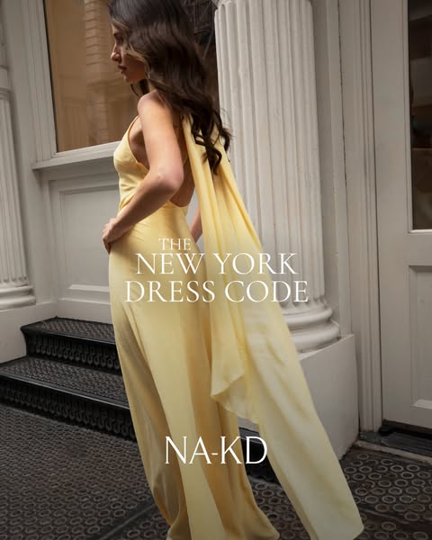 This ad promotes NA-KD's dresses for an upscale clientele, using the tagline "The New York Dress Code" to 