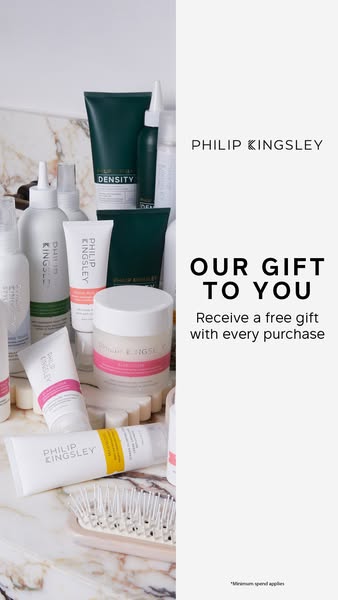 This static image ad for Philip Kingsley features a promotional message highlighting a free gift with every purchase. Th