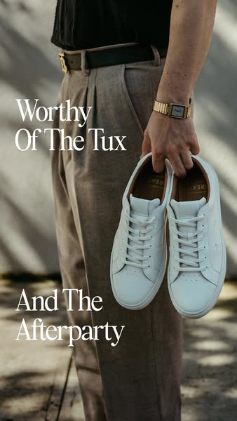 This image ad showcases a pair of white sneakers, suggesting they are versatile enough to be worn with a tuxedo and at a