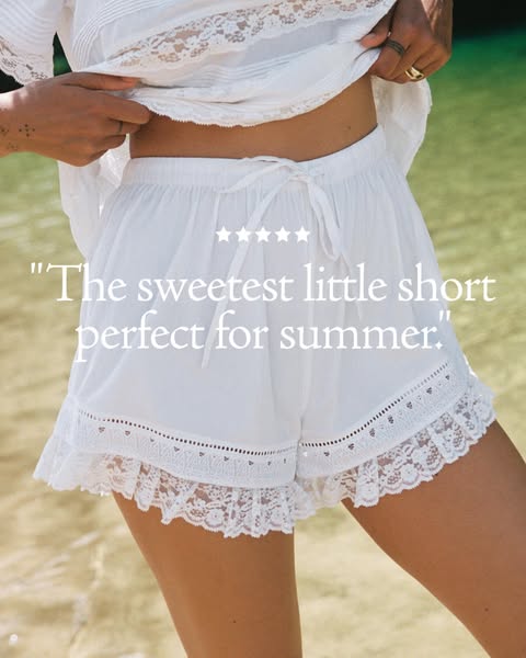This image ad uses a customer testimonial to promote white lace shorts as the perfect garment for summer.