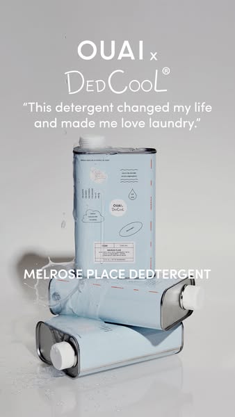 This ad for OUAI Melrose Place Dedtergent features a stack of rectangular detergent containers. The ad includes a testim