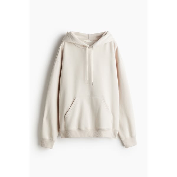 This ad features a single product shot of a beige hoodie. The ad is simple and clean, focusing on the product itself.