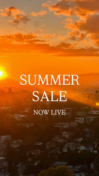 The ad is for a summer sale. The sky is bright orange with a cityscape in the background.