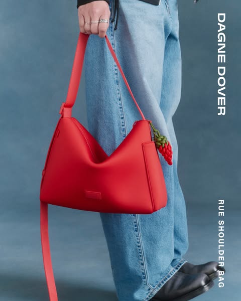 This ad promotes the Rue Shoulder Bag by Dagne Dover, emphasizing its design and overall appeal. The bag is presented as