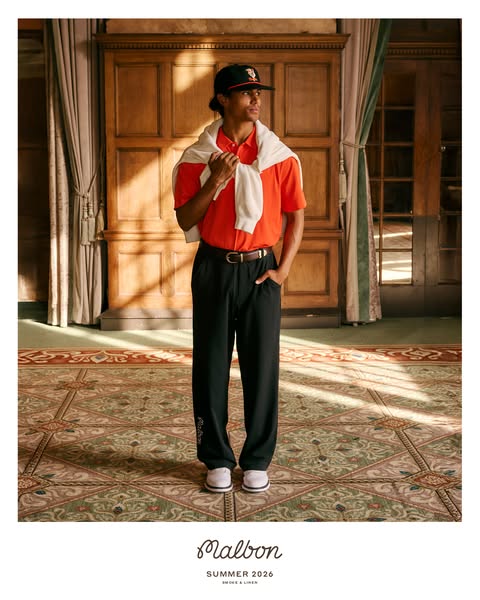 An image ad promoting clothing from Malbon's Summer 2026 Smoke & Linen collection. The ad features a man wearing