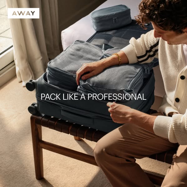 This ad showcases the Away brand's luggage packing cubes in use, as a man packs a suitcase with the cubes. The ad in