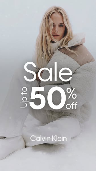 This image ad for Calvin Klein features a woman in a winter coat and pants, with a sale offer of up to 50% off.