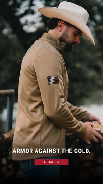 This image ad features a man wearing a tan quarter-zip jacket with an American flag patch on the sleeve. The ad promotes