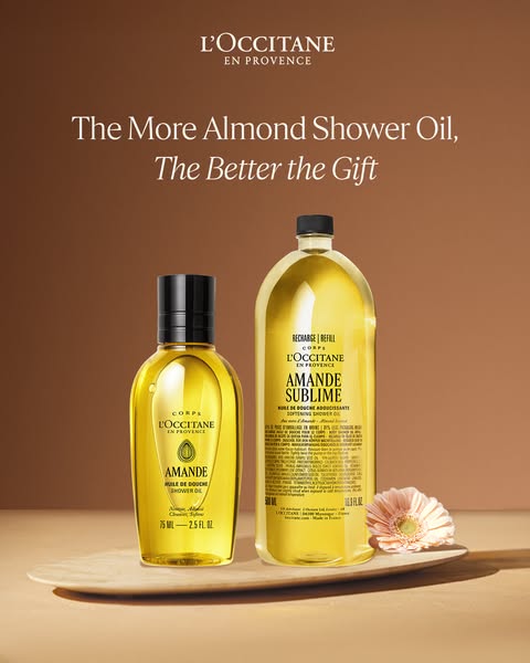 This image ad promotes L'Occitane's Almond Shower Oil, suggesting it makes an ideal gift. It features the produc