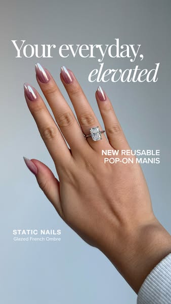 This image ad for Static Nails promotes their new reusable pop-on manis. The ad features a close-up shot of a woman'