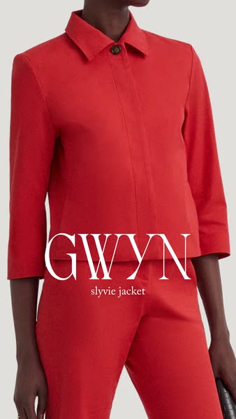 This ad promotes the GWYN Slyvie Jacket, showing a model wearing the bright red jacket and matching pants. The brand nam