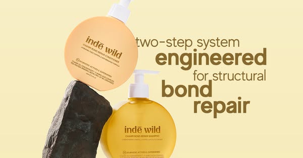 This ad features Inde Wild shampoo and conditioner. It highlights that the two-step system is engineered for structural 
