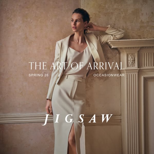 This ad showcases Jigsaw's spring occasionwear. The ad features an image of a model wearing a cream-colored skirt su