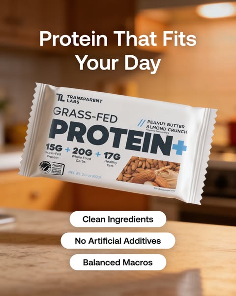 The ad promotes Transparent Labs' grass-fed peanut butter almond crunch protein bar by highlighting its clean ingred