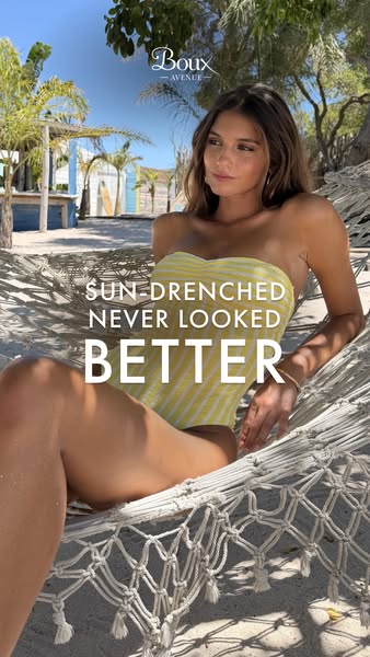 An advertisement for Boux Avenue featuring a model in a yellow bathing suit on a beach.